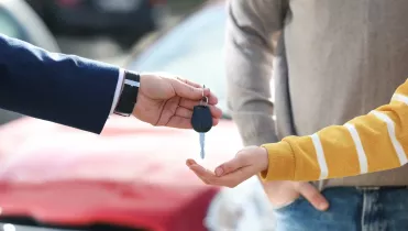 Couple buying a new car