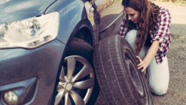 How to Change a Flat Tire Safely on the Side of a Road 